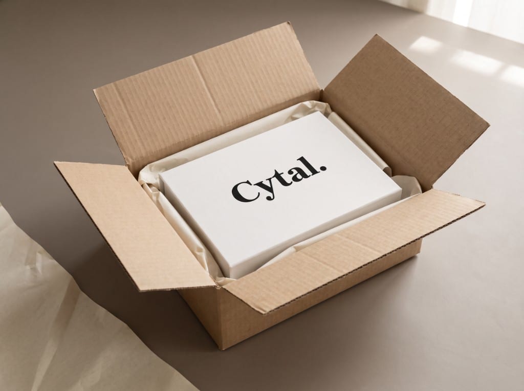 A white Cytal box packed in a cushioned shipping carton, ready to ship