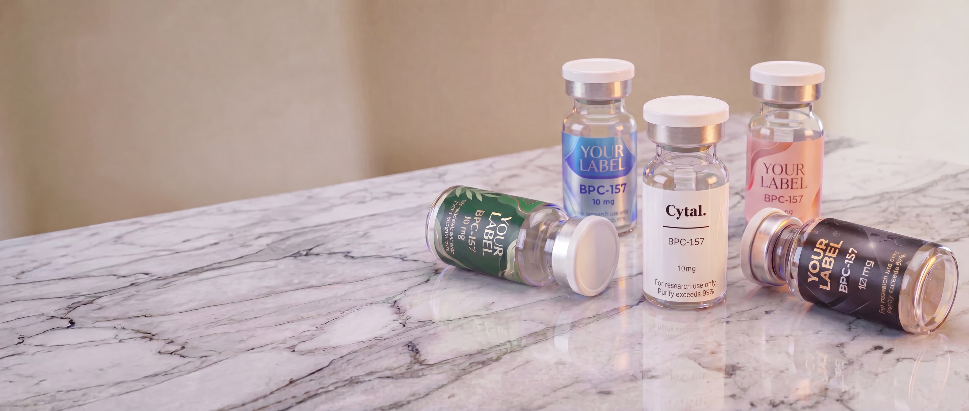 Cytal research-use-only labeled vials on a marble surface